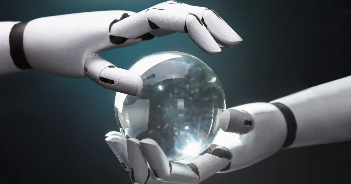Two robot hands hold a crystal ball